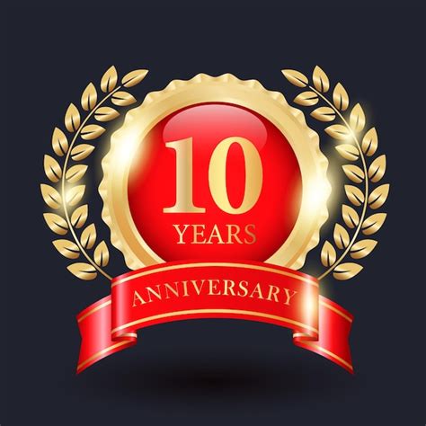 Premium Vector | Celebrating 10 Years Anniversary Logo With Golden Plate, Leaf and Red Ribbon