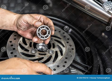 Mechanic Check And Replace Motorcycle Wheel Bearings Working In