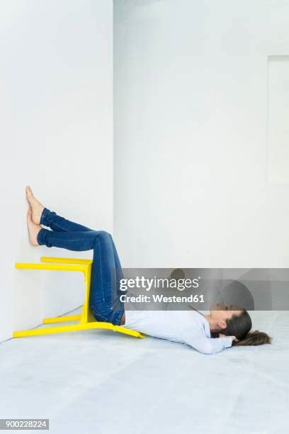 1457 Woman Exhausted In Chair Stock Photos High Res Pictures And