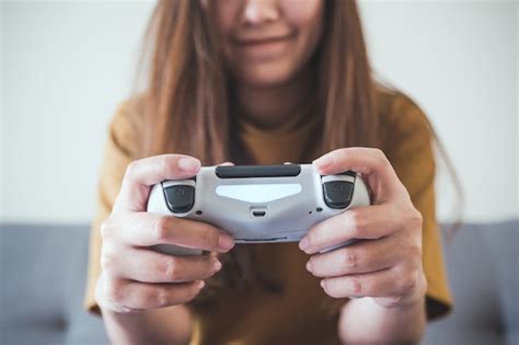 Premium Photo Hand Holding Game Controller