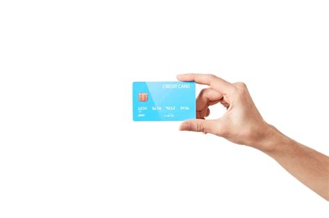 Premium Photo Close Up Of Hand Holding Credit Card Against White