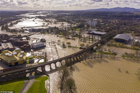 UK weather: Drone photos show devastating impact of floods in ...