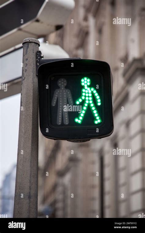 Pedestrian Green Light On A Traffic Light Abiding By The French And