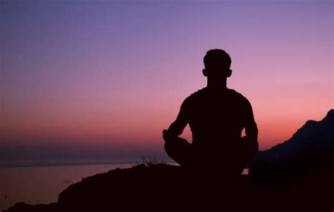 Sitting Man Silhouette In Meditation Pose Stock Photo Download Image