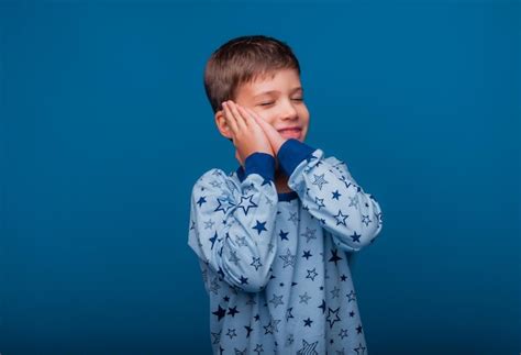 Premium Photo Portrait Of A Cute Little Child Standing With His Hands