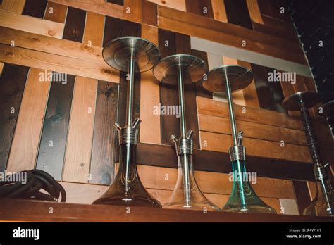 Wood hookah on table in hookah lounge Stock Photo - Alamy