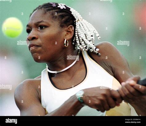 Serena Williams of the U.S. eyes down a volley [from Martina Hingis of ...