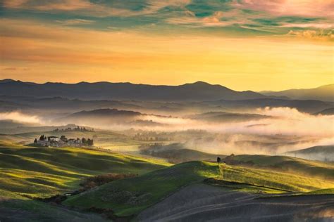 Premium Photo Volterra Foggy Panorama Rolling Hills And Green Fields