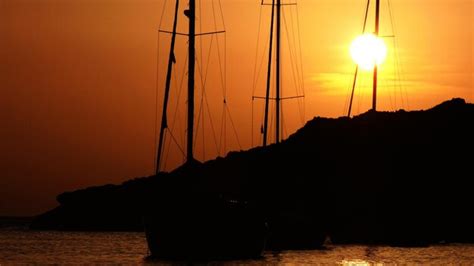 Premium Photo Silhouette Of Sailboat On Sea During Sunset