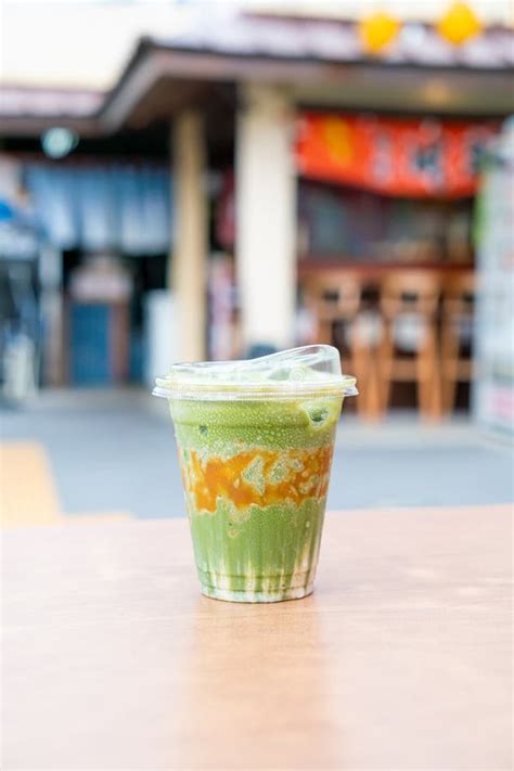 Matcha Green Tea Latte with Caramel Stock Image - Image of drink ...