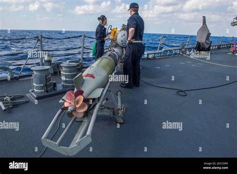 Sonar Technician Performs Prefire Tests On A Surface Vessel Torpedo