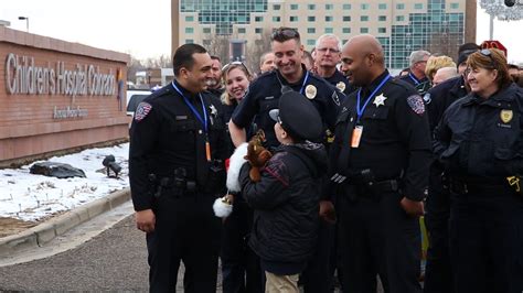 Colorado Police Officers Deliver Holiday Cheer During Long Blue Line