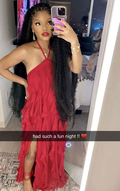 Halle Bailey Covers Her Stomach In A Loose Red Dress For New Selfie And