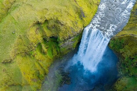 Premium Photo | Aerial drone view of skogafoss waterfall iceland