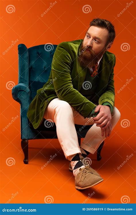 Trendy Bearded Man Sitting On Blue Stock Image Image Of Handsome Contemporary 269586919