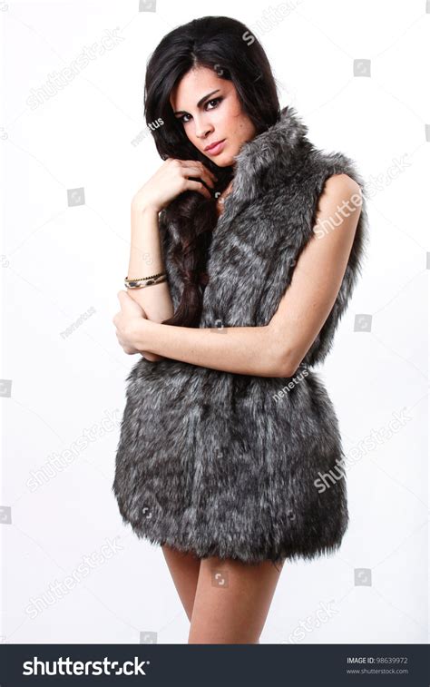 Sophisticated And Beautiful Latin Model With Fur Coat Stock Photo