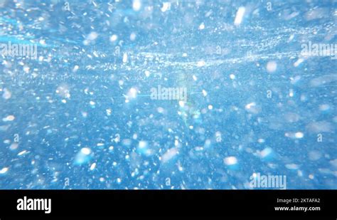 Teenage girl swimming underwater with bubbles Stock Video Footage - Alamy