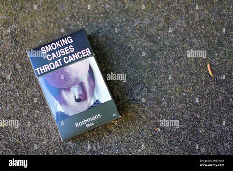 Smoking Causes Throat Cancer Cigarette Package Stock Photo - Alamy