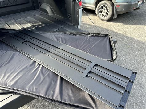 Rivian Will Retrofit The Redesigned Powered Tonneau Cover Only On Some R1ts Autoevolution