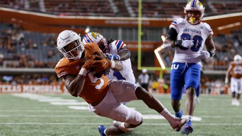 Bijan Robinson injury update: Star Texas running back out for the year with dislocated elbow ...