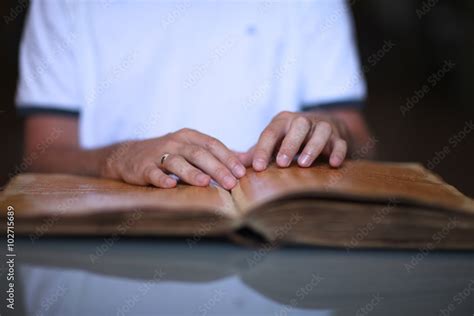 Blind person reading a book Stock Photo | Adobe Stock