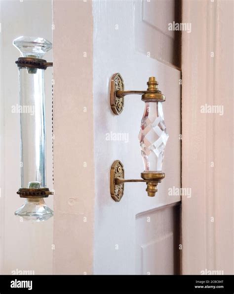 Pocket Door with Glass Door Handles Stock Photo - Alamy