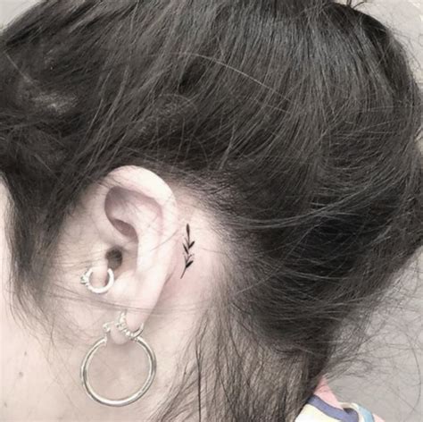 Simple Lotus Flower Tattoo Behind Ear