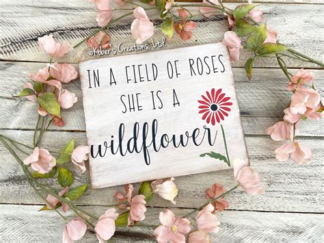 In A Field Of Roses She Is A Wildflower Sign Nursery Sign Etsy