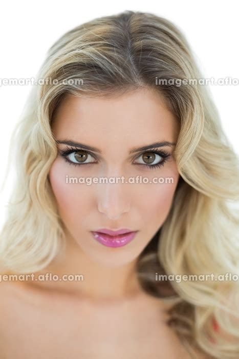 Serious Blonde Model Looking Passionately At Camera On White Background