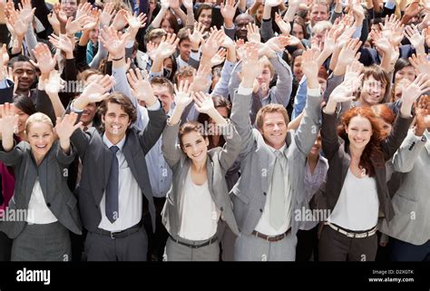 Portrait of cheering business people in crowd Stock Photo - Alamy