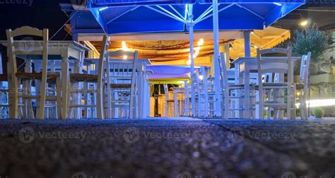 Cafe terrace at night 12813091 Stock Photo at Vecteezy