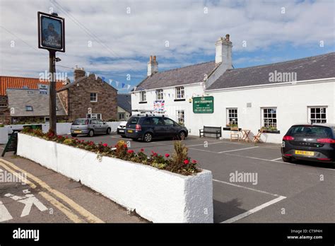 Craster jolly fisherman hi-res stock photography and images - Alamy