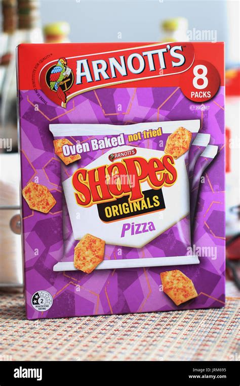 A Box Of Arnotts Oven Baked Shapes Originals Pizza Crackers Stock