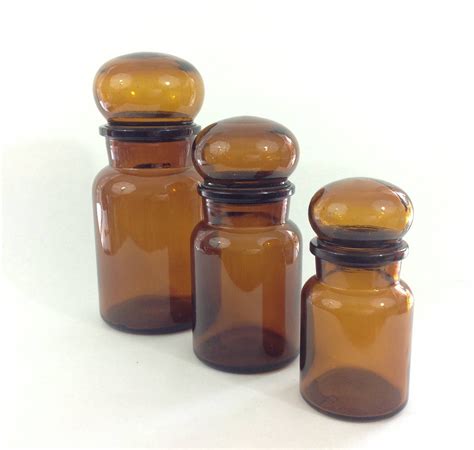 Vintage Amber Glass Apothecary Canisters Made In Belgium Etsy Amber Glass Glass Apothecary