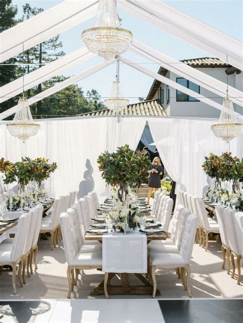 Elegant Tented Wedding Reception Adorned With Impressive Hanging