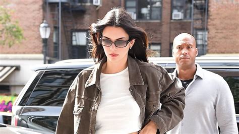 Kendall Jenner Flashes Her Taut Tummy In A White Crop Top As She Steps