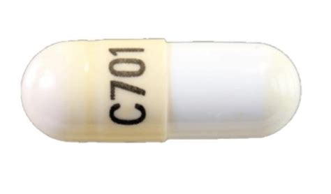 C701 Pill Yellow And White Capsuleoblong Pill Identifier