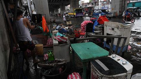 'Back to zero': Manila flood victims come to terms with their losses ...