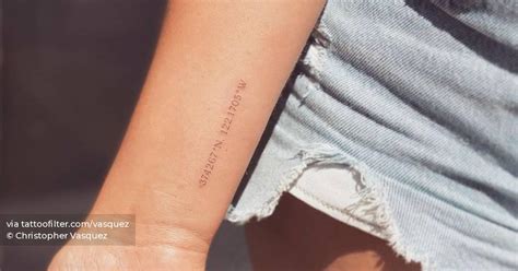 Coordinates Lettering Tattoo On The Wrist