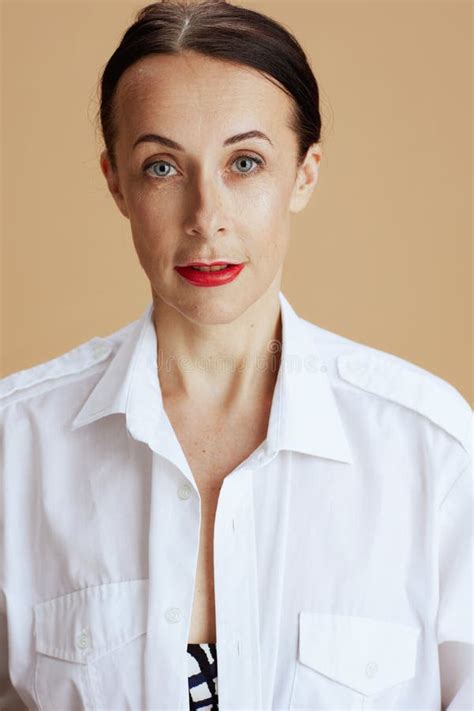 40 Years Old Woman In White Shirt Isolated On Beige Stock Illustration