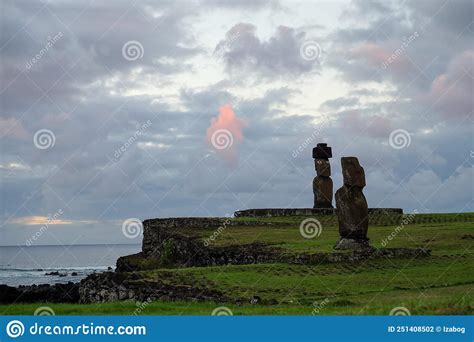 Beautiful Sunset Over Moai Statues in Hanga Roa Stock Photo - Image of ...