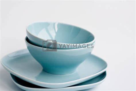 Four Pale Blue Plates Are Heaped On A Light Background By Myrka Vectors And Illustrations With