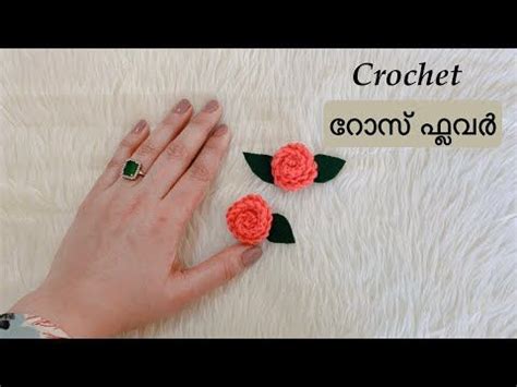 Crochet Rose Ring In Pink And Orange With Green Leaves On White Furnishing