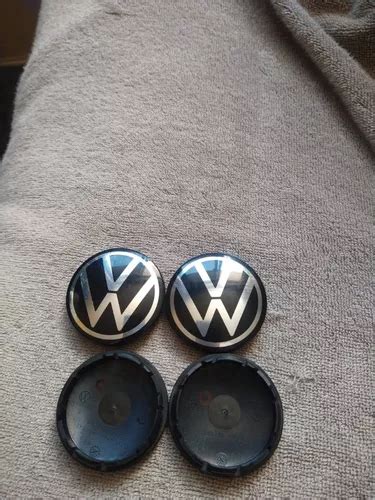 4 Centros De Rin Vw Vento Golf Nuevo Logo 1s0601171 55 Mm MercadoLibre