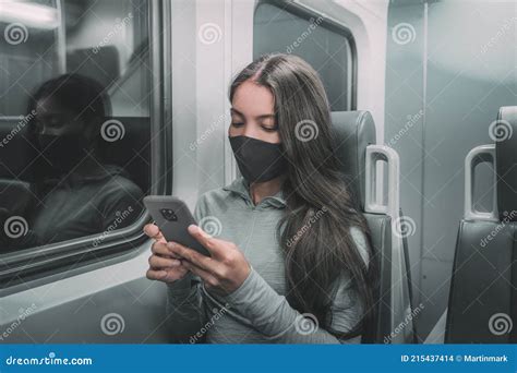 Public Transport Commute Woman Commuter At Night Wearing Face Mask