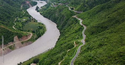 Breathtaking Aerial View Of Bp Highway In Sindhuli Nepal As The Drone Captures The Winding