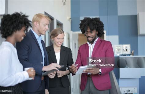 Group Of Successful Diverse Business Partners Having A Business Meeting