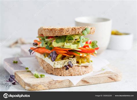 Vegan Sandwich Tofu Pepper Carrots Hummus Green Dressing Board Stock