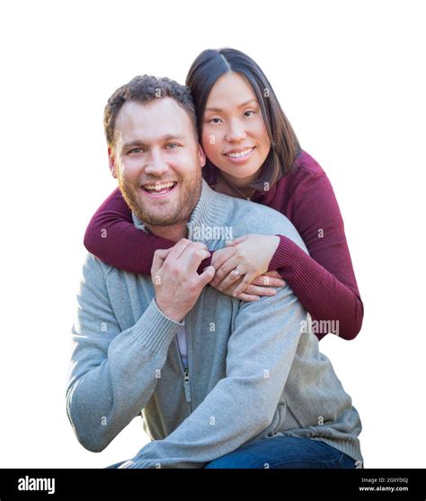 Mixed Race Caucasian And Chinese Couple Isolated On A White Background