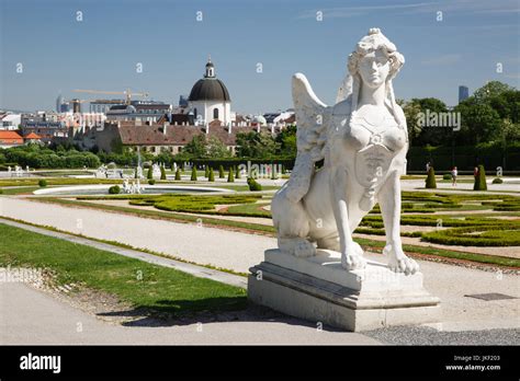 Sphinx Sculpture On Alley In The Garden Of Upper Belvedere Palace In